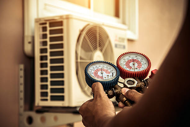 Professional Heat Pump Repair technician working in Massillon, OH